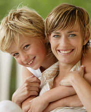 woman and boy smiling